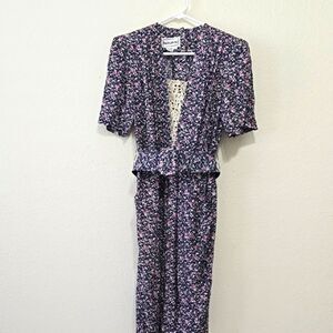 - Karin Stevens Pink and Black Jumpsuit with V-Neck and Tie Waist